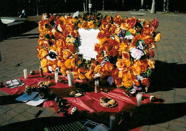 This "ofrenda," or altar, is from a past MEChA Dia De Los Muertos event. The 2009 event will feature a workshop to teach attendees how to make altars such as this one.