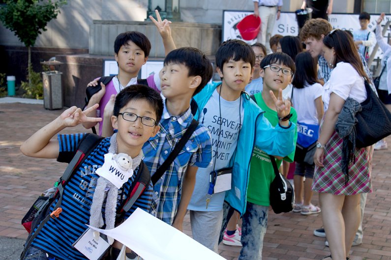 A group of students from Cheongju, South Korea, mug for the camera at a farewell ceremony Friday, Aug. 12, at Bellingham City Hall. Photo by Christopher Wood | University Communications intern