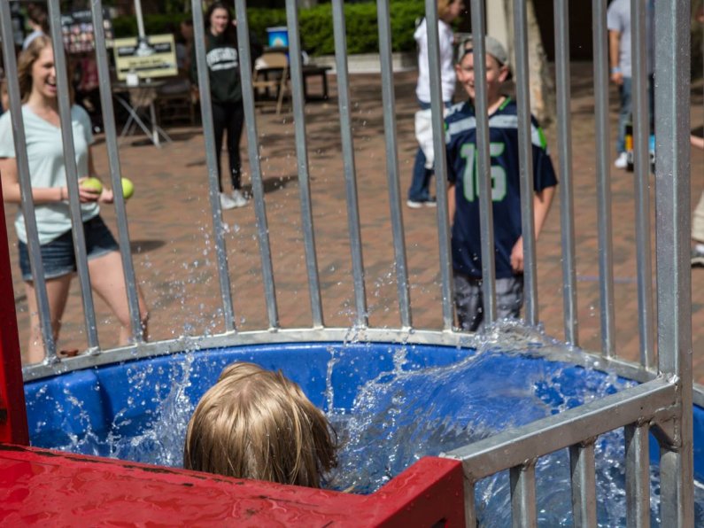 Dunk tank at the Red Square carnival. Photo by Jonathan Williams / WWU