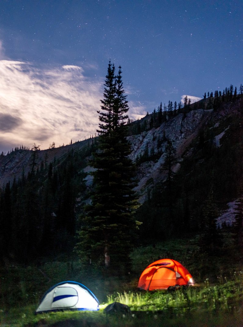 Students camped below Tamarack Peak and a full moon on August 9.