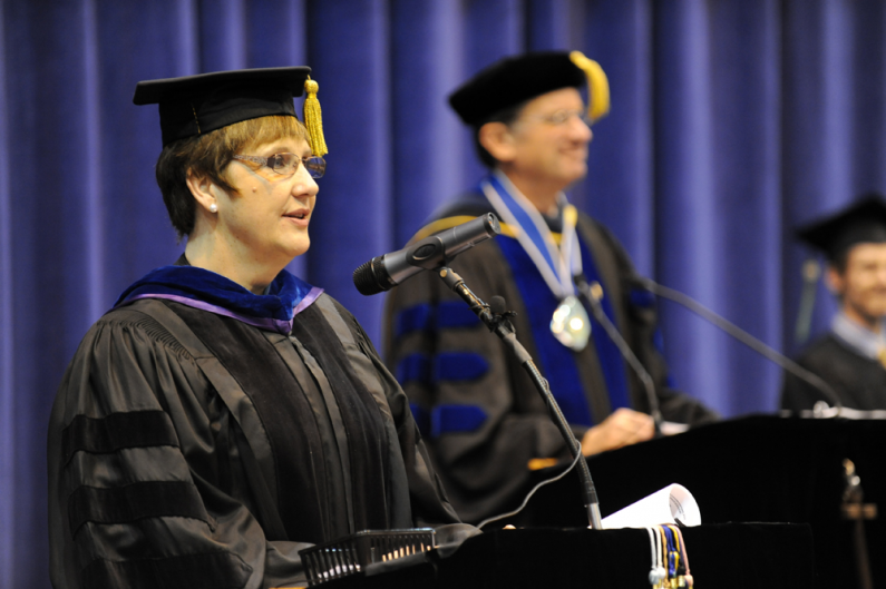 WWU Provost and Vice President for Academic Affairs Catherine Riordan announces to President Bruce Shepard, right, that the graduates can receive their diplomas. Photo by Rachel Bayne