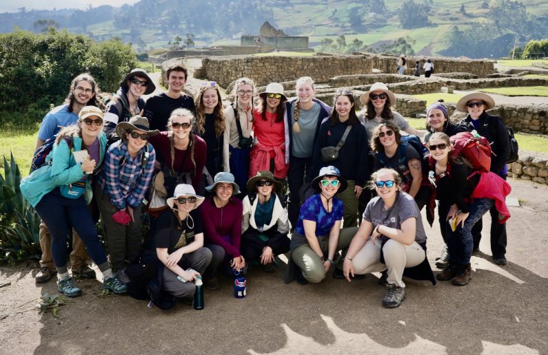 Students pose for a picture in front of the ruins of Ingapirca.