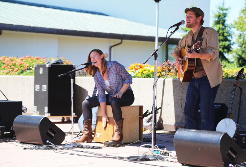 Singer/songwriter Ky Burt, along with Jean Williams, kicked off the Summer Noon Concert Series with a performance on the PAC Plaza Wednesday, July 1. The 33-year-old from Colorado played a mix of original New Americana, Folk Blues and Indie music. Photo b