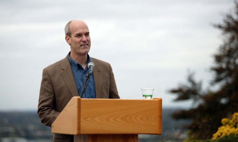 Rick Larsen refers to remarks he entered into the Congressional Record during Friday's celebration. Photo by Matthew Anderson | WWU