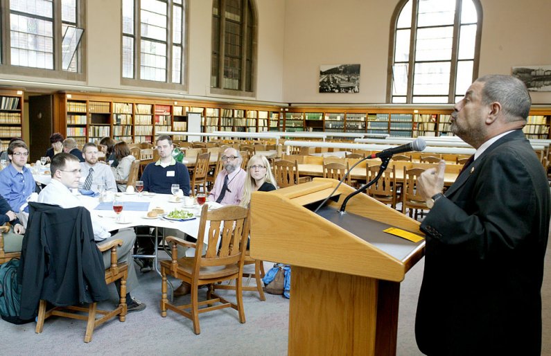 U.S. Consul General Philip Chicola chats with students during a lunch seminar on foreign service in the Wilson Library Reading Room Thursday, May 26. Photo by Shea Taisey | University Communications intern