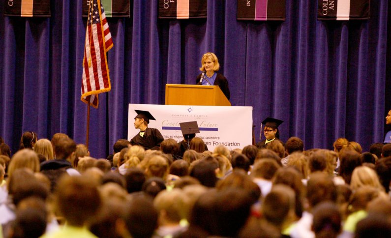 Cyndie Shepard, director of the Compass 2 Campus program, speaks to the assembled students during the Oct. 26 opening ceremony in Carver Gymnasium on campus. Photo by Matthew Anderson | WWU