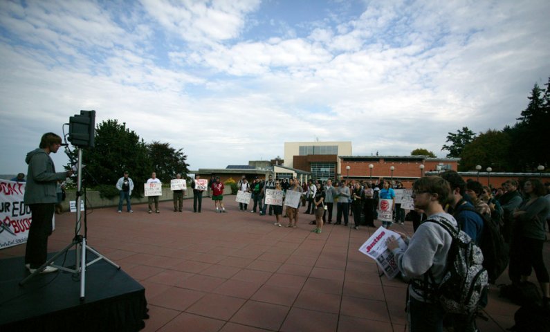 WWU students and community members gather at a rally to defend public education on Oct. 6, 2010. Speaking is Byron Starkey, Associated Students vice president for governmental affairs. Photo by Matthew Anderson | WWU