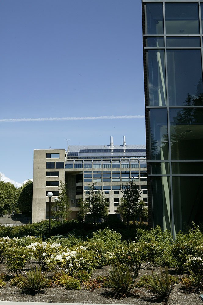 The Environmental Studies building, background, sits to the north of the recently constructed Communications Facility on the Western Washington University campus. Photo by David Scherrer | WWU
