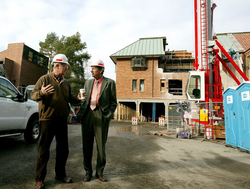 State Sen. Dale Brandland (R-Bellingham), left, talks with WWU President Bruce Shepard outside Miller Hall on the WWU campus Wednesday, Jan. 6. Miller Hall is in the midst of a $60.4-million renovation project. Photo by Matthew Anderson | WWU
