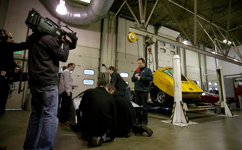 Peter Stützer, host of the German automotive program "Auto Mobil - Das VOX Automagazin," is filmed by cameraman Mike Lenzenbach in the VRI Thursday morning, Jan. 14. The show is set to air on Jan. 24. Photo by Matthew Anderson | WWU