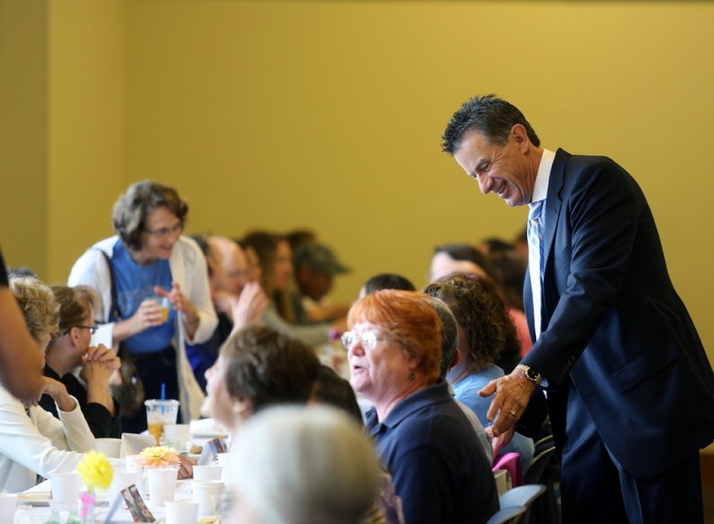 Western President Bruce Shepard chats with faculty and staff members during the convocation breakfast Sept. 18 in the Viking Commons. Photo by Matthew Anderson | WWU