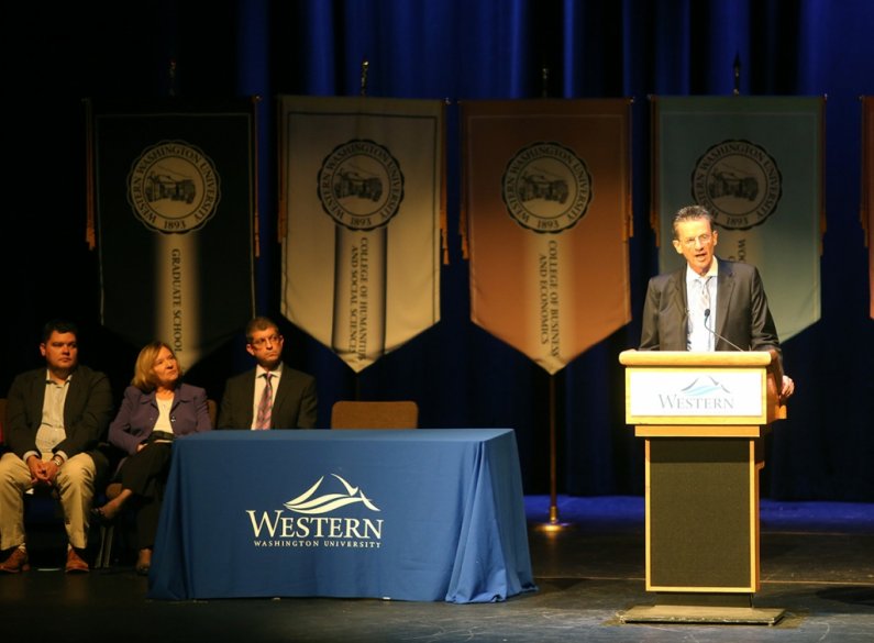 Western Washington University President Bruce Shepard delivers his annual convocation remarks to a packed Performing Arts Center Mainstage Theater Wednesday morning, Sept. 18. Photo by Matthew Anderson | WWU