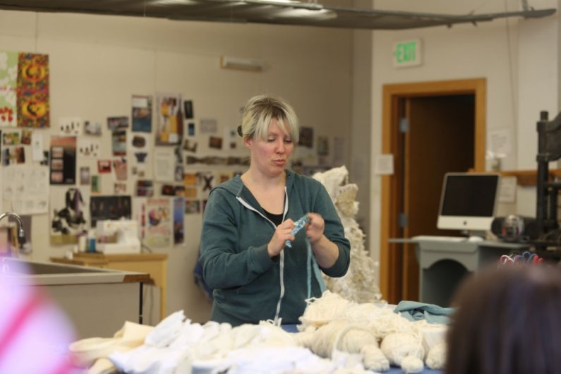 Artist Mandy Greer conducts a crochet workshop at Western Washington University Tuesday, April 30, based on one of her recent works. Photo by Sam Heim | Communications and Marketing intern