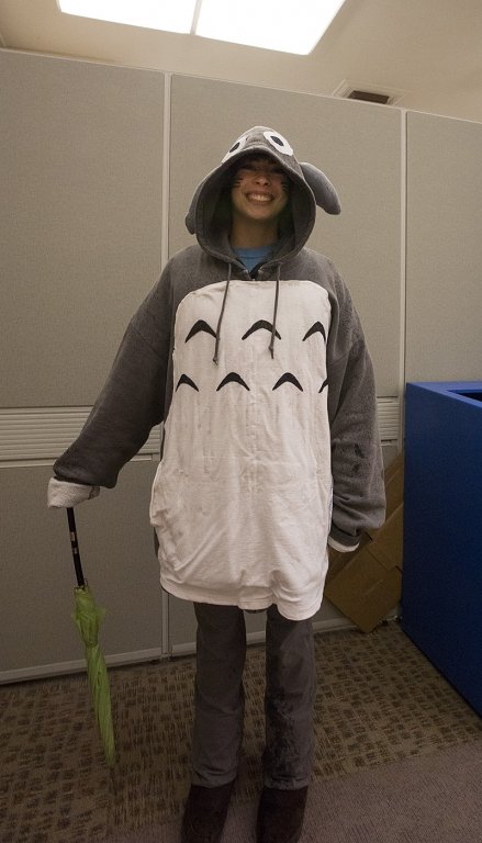Libby Hale poses as Totoro, from the animated movie “My Neighbor Totoro,” Wednesday, Oct. 31. The homemade costume kept her warm, she said, and it came in handy that the umbrella, which is part of the costume, is also functional on a rainy Halloween. Phot
