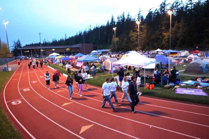 Walkers taking part in Relay For Life head around the track at Western Washington University on May 15, 2010, in Bellingham. Photo by Mark Malijan | For WWU
