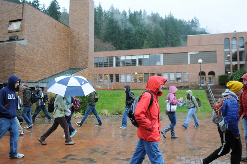 Western students walk through heavy rain on a dark day Wednesday, March 30, 2011. Photo by Daniel Berman | University Communications intern