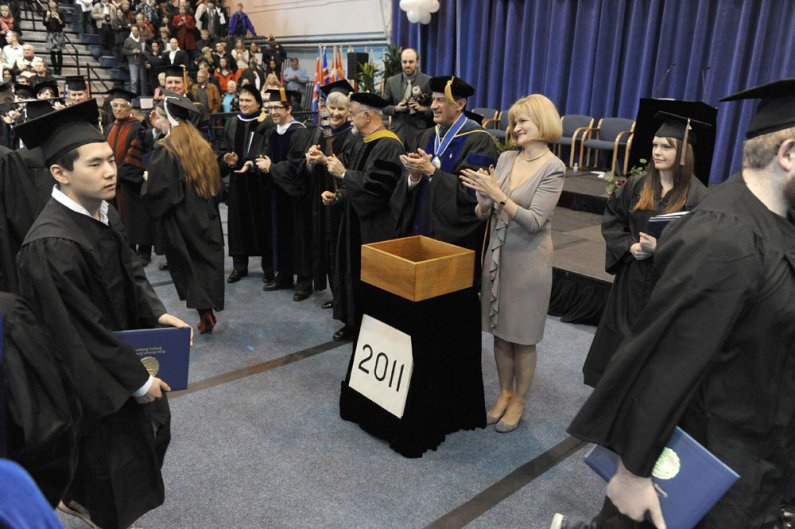 Bruce and Cyndie Shepard congratulate winter 2011 graduates of Western Washington University. Photo by Dan Levine