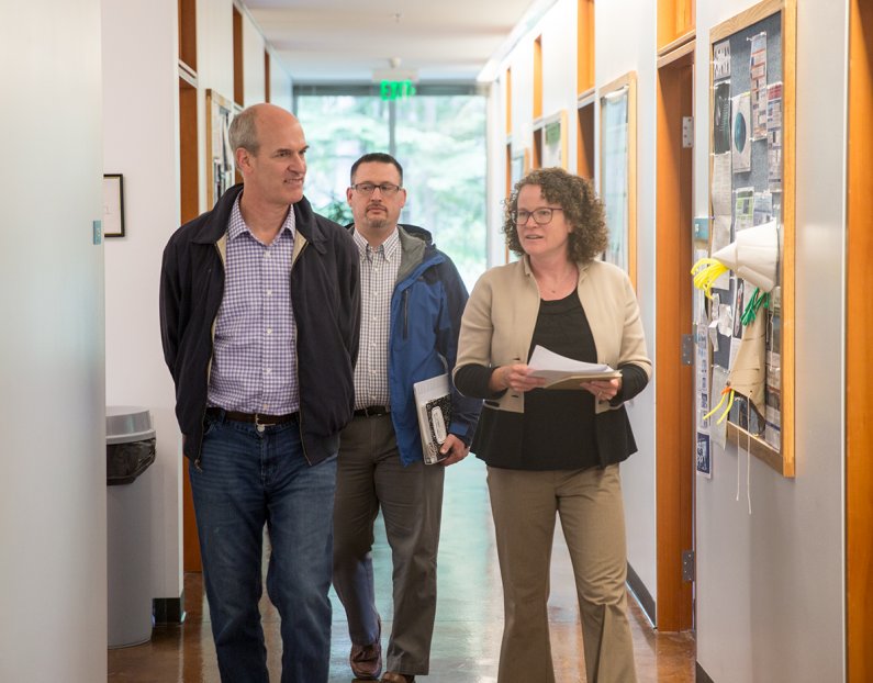 Rep. Rick Larsen, left, tours the Shannon Point Marine Center Wednesday, May 4, with Erika McPhee-Shaw, the SPMC director. Photo by Matthew Anderson / WWU
