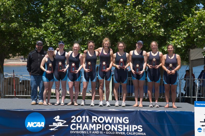 The WWU women's rowing team won its seventh-consecutive NCAA Division II national championship by dominating the field on Sunday. Here, members of the victorious varsity eight pose with their trophy. Courtesy photo