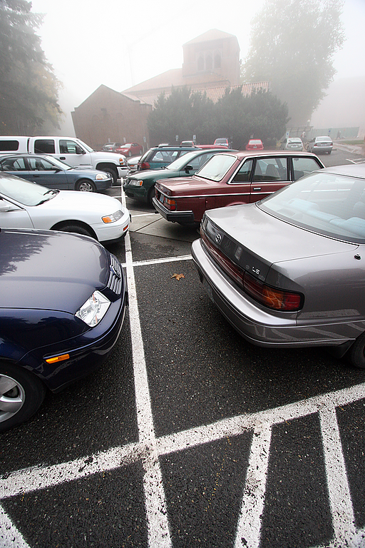 Parking spaces in Lot 10G, the lot next to Fraser Hall, have been relined recently to squeeze more cars into the area. Photo by Michael Leese | WWU intern