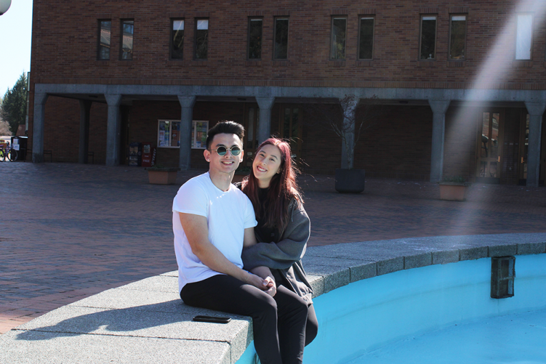 Damien Bassett, left, a Kinesiology major from Bothell, and Anna Gould, a Business Management major from Mukilteo, pause on a walk through Red Square.