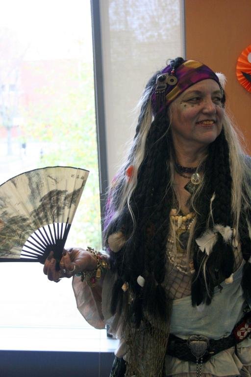 Library employee Cile Stanbrough, left, shows off her costume (she's dressed as Calypso, from "Pirates of the Caribbean") during the Western Libraries' scavenger hunt on Oct. 28. Photo by Michael Leese | WWU intern