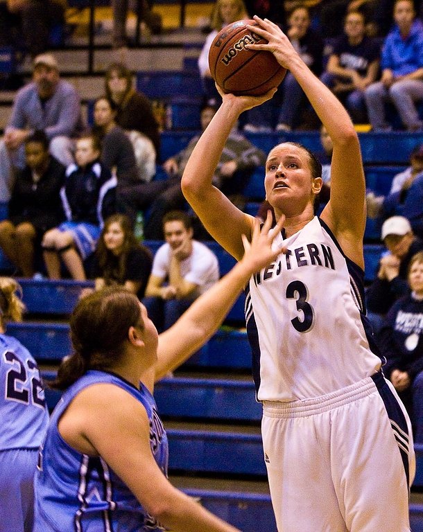 Jessica Summers takes a jump shot over a Sonoma State player. Photo by Jon Bergman | WWU intern