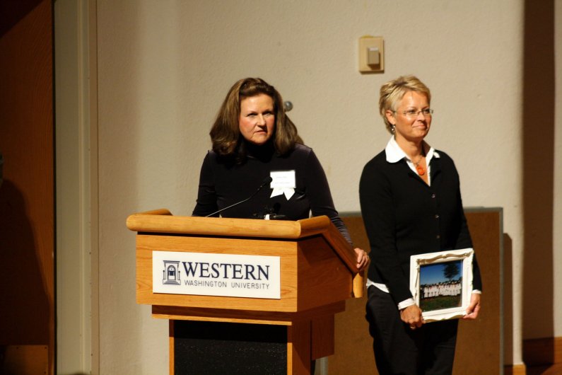 Debra Akre, left, of Tembo Trading Company participates in the April 27 ceremony at WWU honoring Noemi Ban. Photo by Shea Taisey | University Communications intern