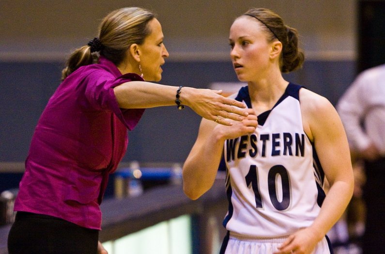 Vikings coach Carmen Dolfo, in her 19th season at Western, directs guard Amanda Dunbar for the next play during the Vikings 66 to 58 win over Sonoma State. Photo by Jon Bergman | WWU intern