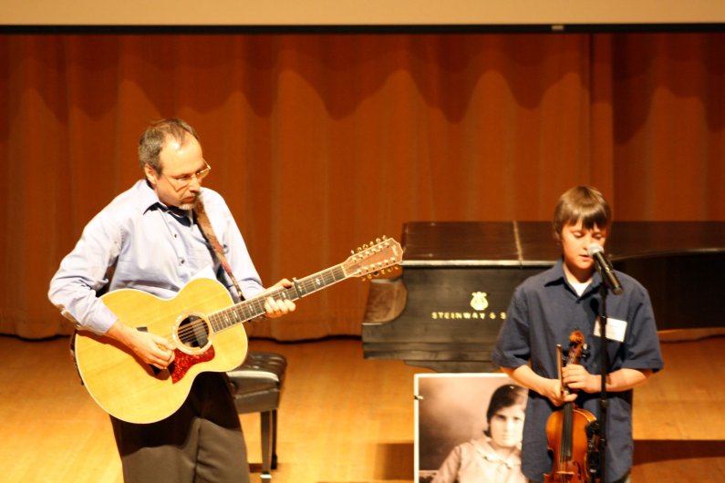 Members of the Timothy McHugh family perform at the April 27 ceremony honoring Holocaust survivor and educator Noemi Ban. Photo by Shea Taisey | University Communications intern