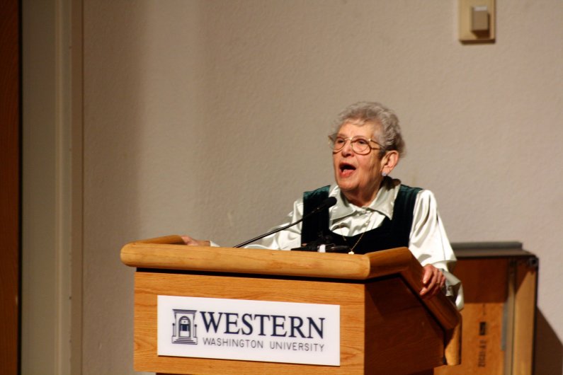 Noemi Ban, a Bellingham resident, award-winning teacher and survivor of the Holocaust, talks at the April 27 ceremony held in her honor. Photo by Shea Taisey | University Communications intern