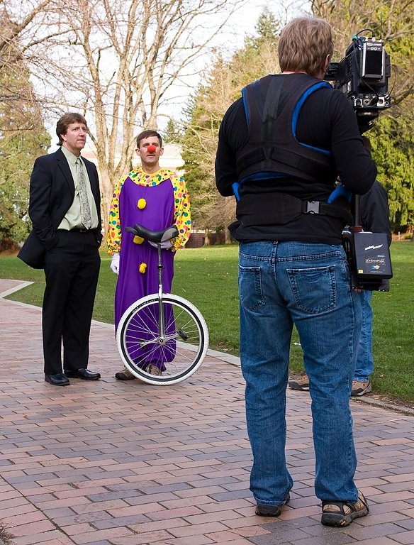 A Canadian film crew shooting for the Canadian Broadcasting Company films Western Washington University professor Ira Hyman and unicyclist Joe Myers, who works in WWU Facilities Management, on campus Friday, Jan. 22. The crew was on campus to re-stage Hym