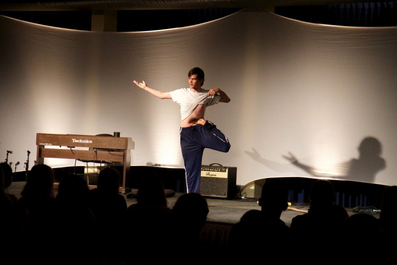 BJ Hanson performs on behalf of Nash Hall, making the audience and judges gasp with amazement as he distorts his body to extremes in his contortion act. Photo by Beatrice Harper / WWU Communications and Marketing intern