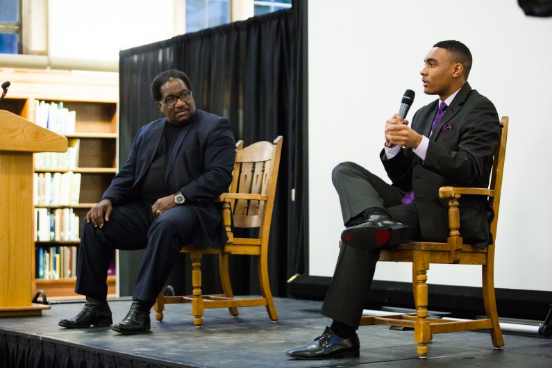 The Rev. Marshall Hatch, left, and TJ Robinson answer questions from the audience during the 2016 WWU MLK ceremony Jan. 19. Photo by Rhys Logan / WWU
