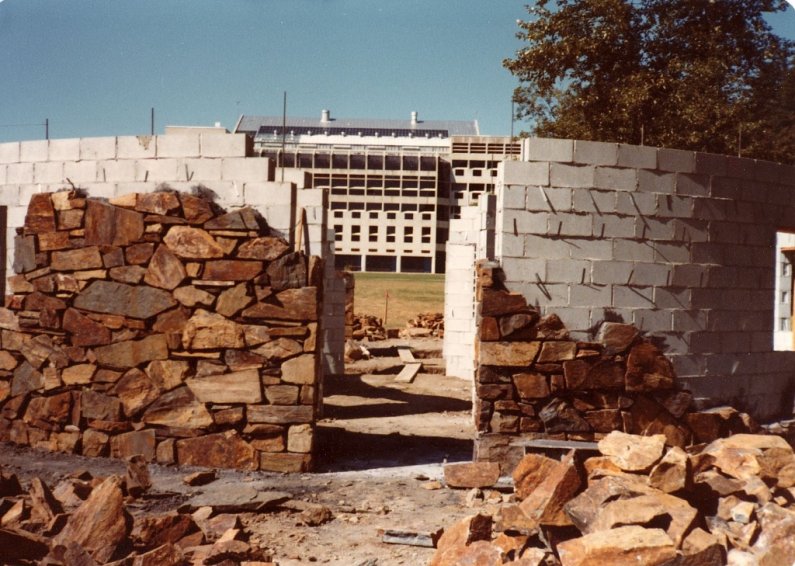 Nancy Holt's "Stone Enclosure: Rock Rings" sculpture is constructed in the field south of the Environmental Studies building on the Western Washington University campus in 1978. Courtesy photo