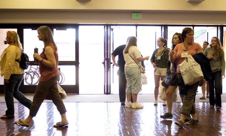 Parents and students enter the Performing Arts Center for Summerstart orientation on Aug. 1 at Western Washington University. Photo by Christopher Wood | University Communications intern