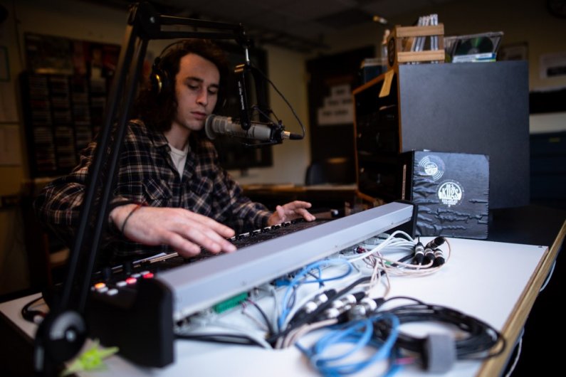 Photo at KUGS, Western’s on campus radio station, senior and liberal studies major Jeremy Meehan DJs during the blues radio hour. KUGS can be found on the airwaves at 89.3fm.