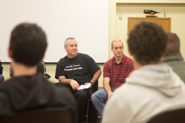 Ben Atherton-Zeman (left) and Western Staff Member Mark Green (right) listen to a group discussion on violence on Nov. 17. Photo by Christopher Wood|University Communications Intern