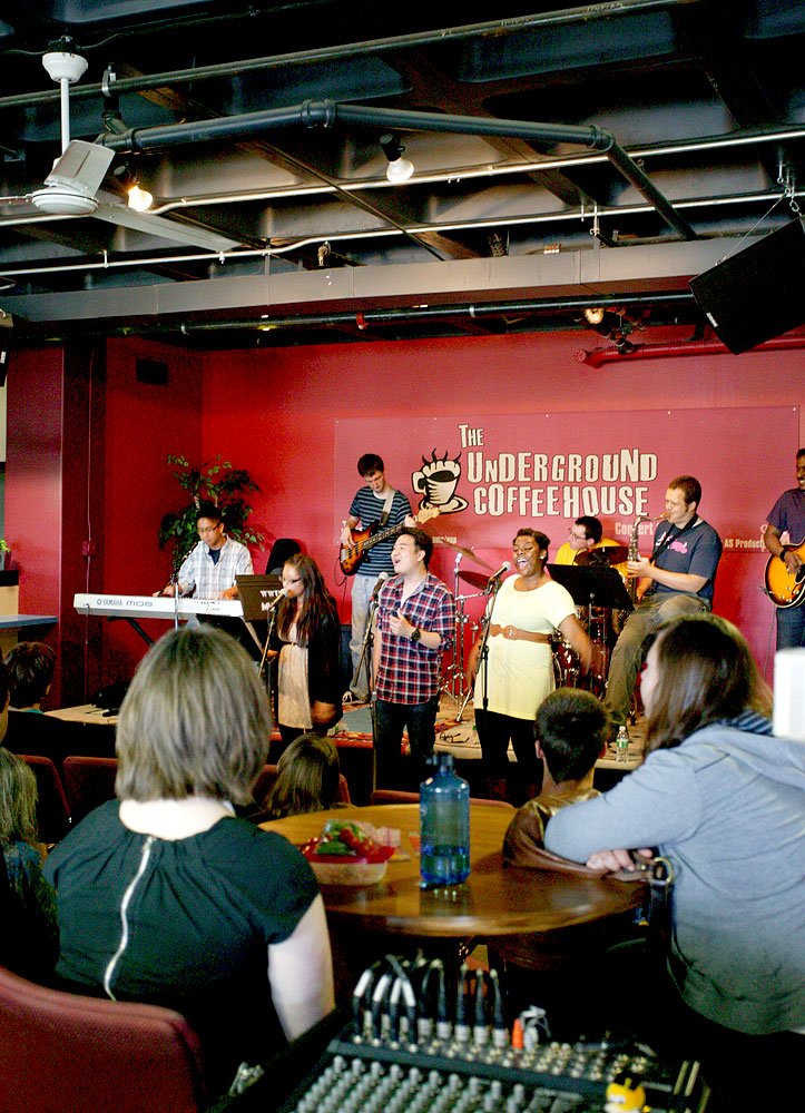 Rashawn Scott provides vocals for The Prime Time Band during the group's summer noon concert Wednesday, July 20, in the Underground Coffeehouse at Western Washington University. Photo by Matthew Anderson | WWU