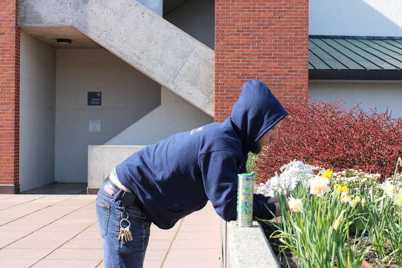 Eric Christensen, a WWU custodian, takes a break from working on campus.
