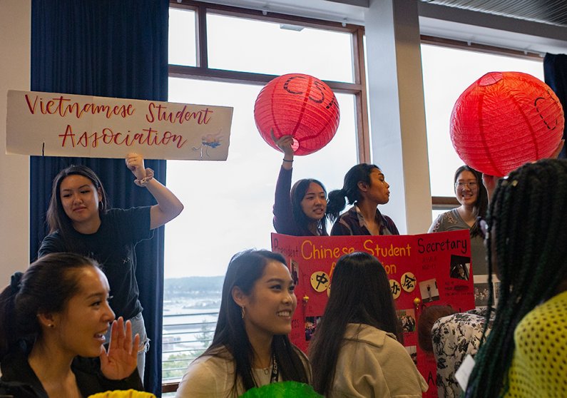 Representatives from the Vietnamese Student Association and the Chinese Student Association drawing in crowds at the WWU AS Info Fair on Sep 23. 