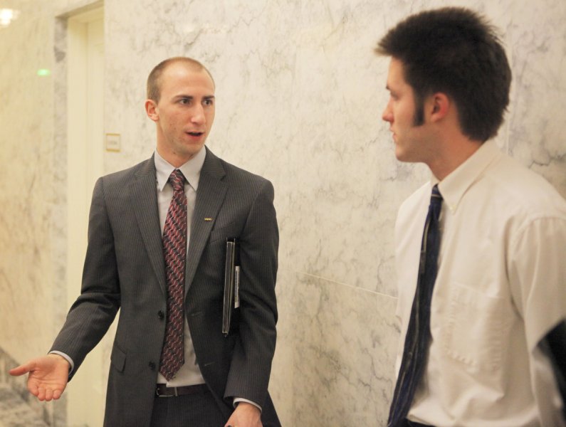 Associated Students President Colin Watrin debriefs with WWU senior Michael Lang after the meeting with Senator Derek Kilmer of the 26th Legislative District. Photo by Alex Roberts | University Communications intern