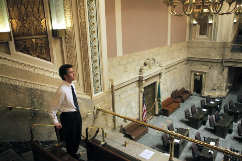 Western senior Michael Lang looks out at the empty house chambers. Photo by Alex Roberts | University Communications intern
