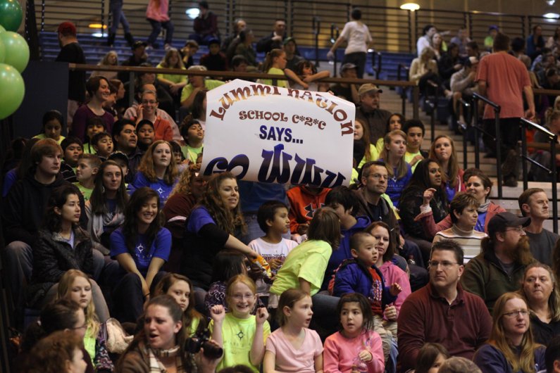 Students involved in the Compass 2 Campus youth mentoring initiative at Western Washington University were honored at a Jan. 28 home basketball game in Carver Gymnasium. Photo by David Rzegocki for WWU