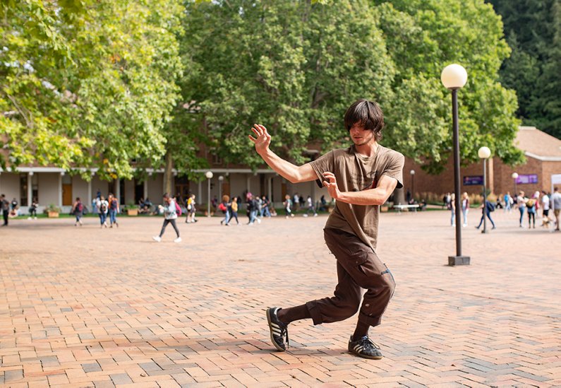 student practices kung fu in red square