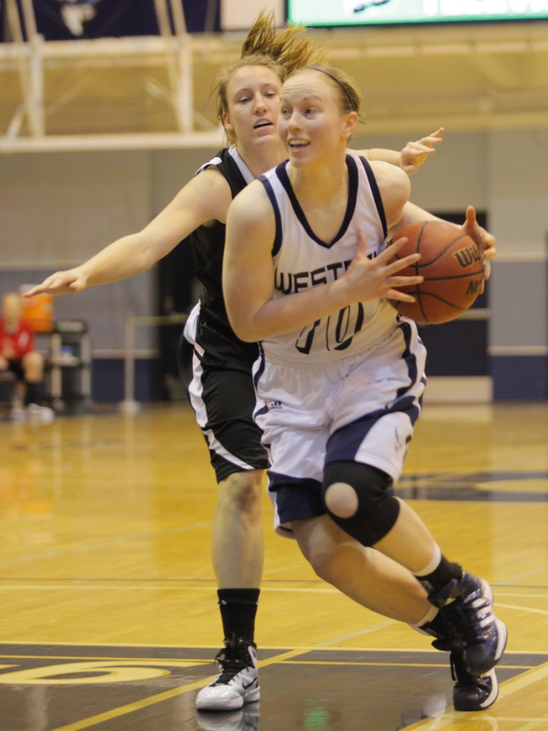 Western was able to pull ahead of Northwest Nazarene University with a final score of 64-59 late in the game Thursday, Jan. 27.  Western senior Megan Pinske scored a game high 18 points, helping Western to secure its 11th straight victory. Photo by Alex R