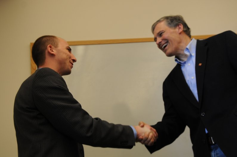 U.S. Representative Jay Inslee shakes hands with A.S. President Colin Watrin during a visit to Western Thursday, April 21. Photo by Daniel Berman/University Communications intern