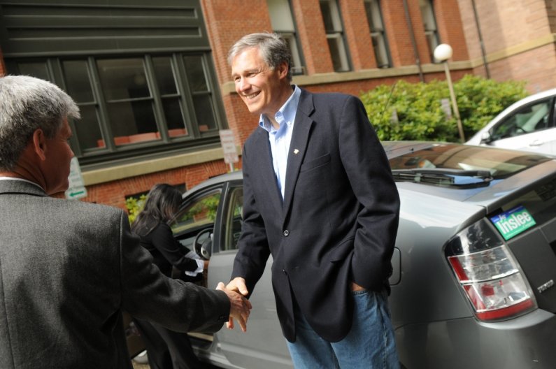 U.S. Representative Jay Inslee shakes hands with Steve Swan, Western V.P. for University Relations, during a visit to Western Thursday, April 21. Photo by Daniel Berman/University Communications intern