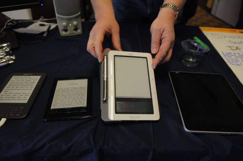 A selection of e-readers on display during the Techtonic 2011 Digital Uprising event Friday, May 6 in V.U. 565. Left to right are the Amazon Kindle, the Sony Reader, Barnes & Noble Nook and Apple iPad. Photo by Daniel Berman | University Communications in