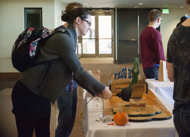 Joycelyn Blue plays the Frog Hop game featured at The Fair, hosted by Western Sustainability, on Wednesday Oct. 14, 2015. Photo by Kyra Betteridge / WWU Communications and Marketing intern